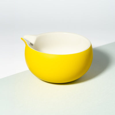 Yellow and white matcha bowl with spout