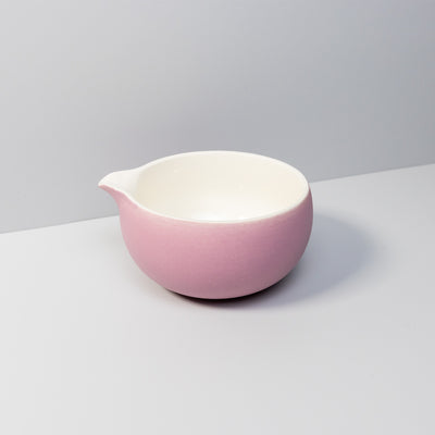 Handcrafted rose ceramic matcha bowl with a pouring spout.