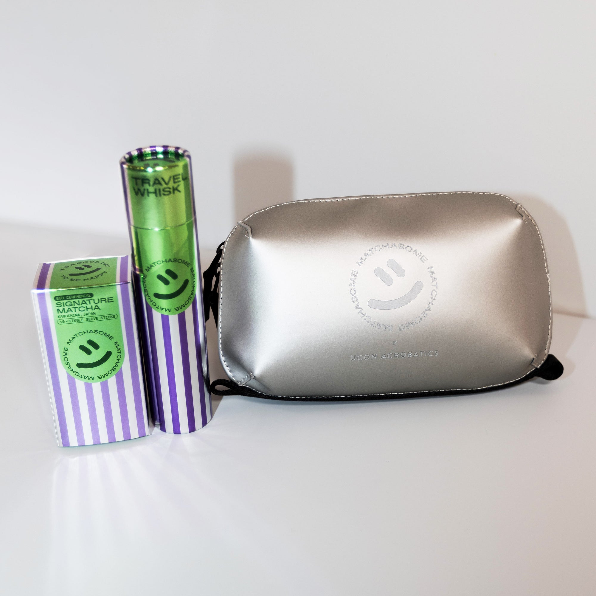 Silver matcha travel with single serve matcha sticks and travel whisk. Ucon Acrobatics pouch.